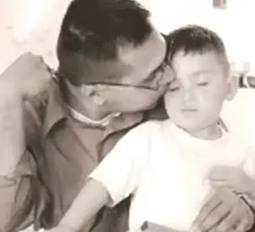 Austin as a boy with his dad, Jorge