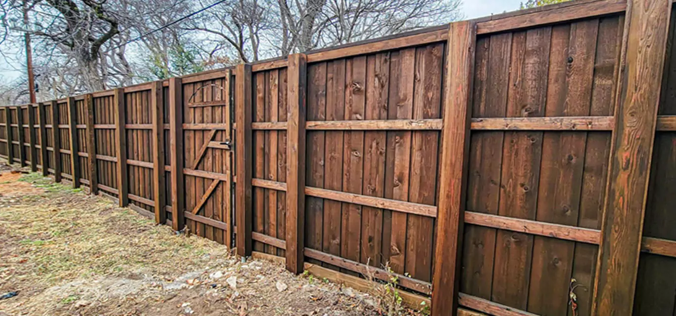 8 ft board-on-board cedar fence with boxed-in steel posts