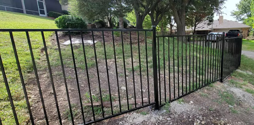 Black wrought iron style fence