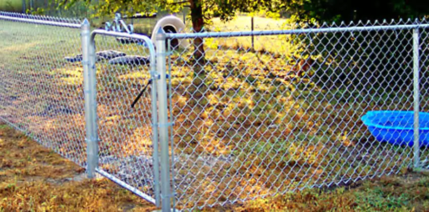Chain link fence with a walk gate