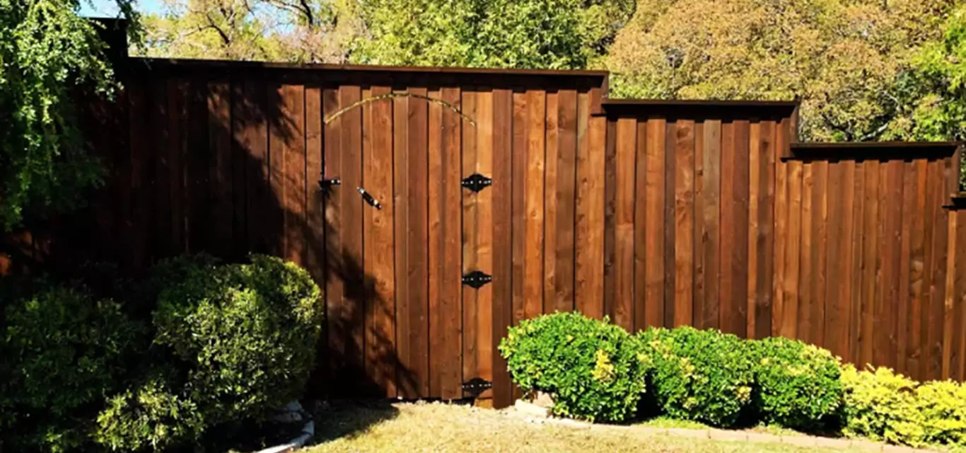 Cedar fence stepping down a slope