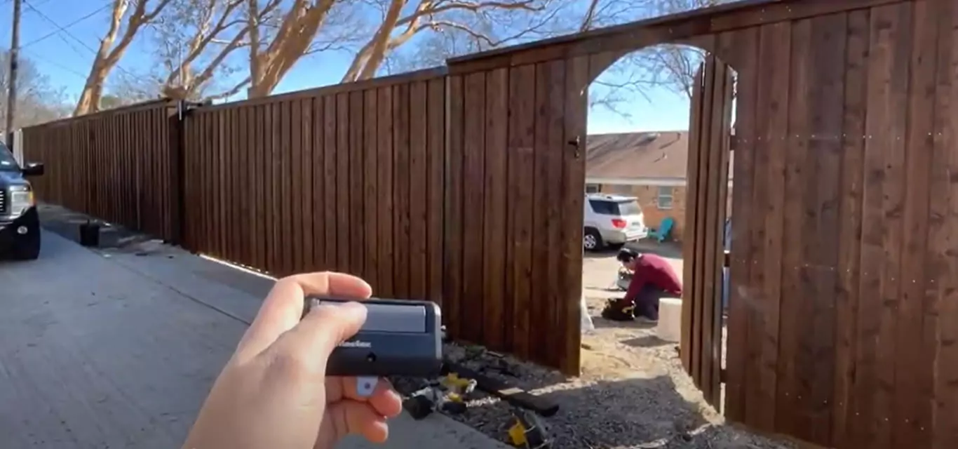 Automatic cedar sliding driveway gate opening with a remote