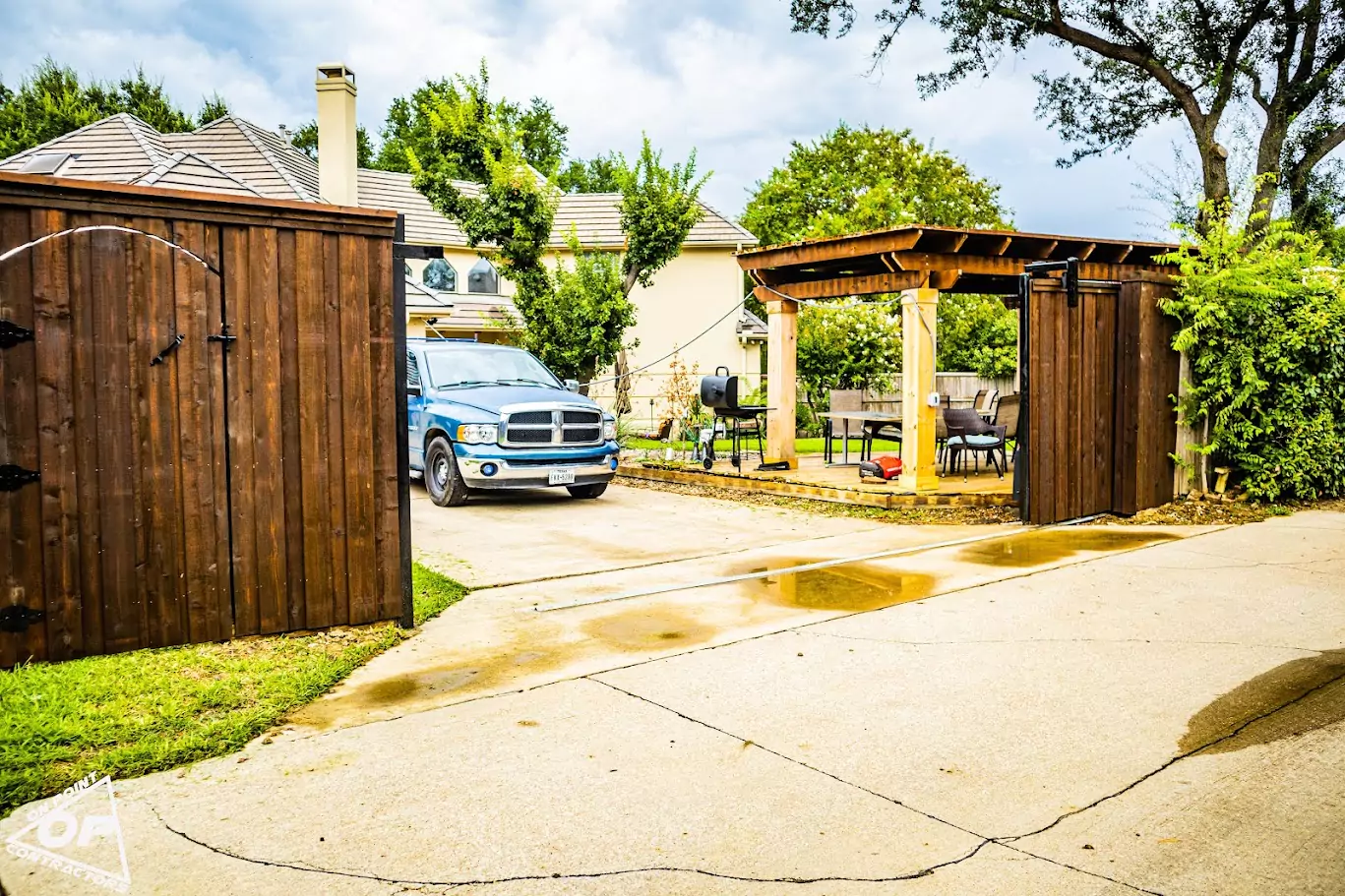 Western Red Cedar 8-ft Board-on-Board Fence with LiftMaster CSL24UL Sliding Gate