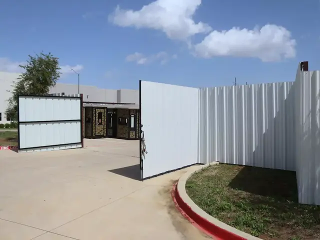 Sheet metal fence and gate