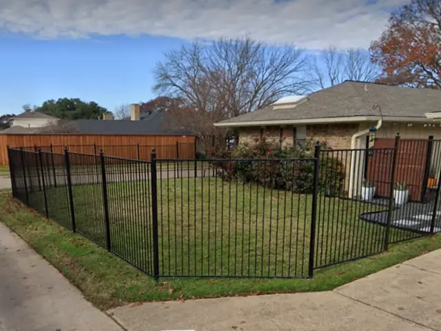 Black wrought iron fence