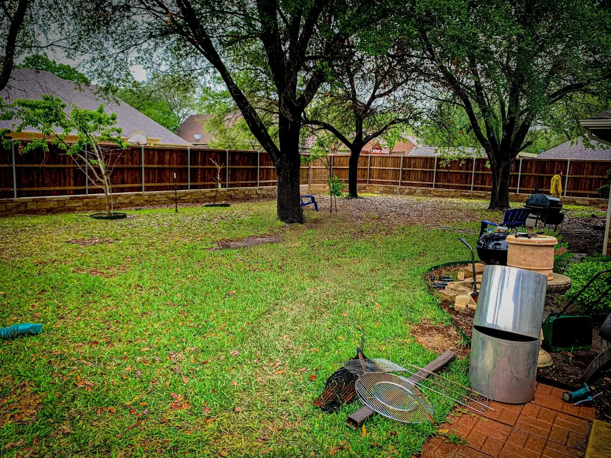 Cedar fence built on top of a stone retaining wall in DFW, photo 6