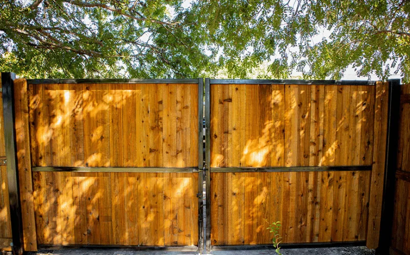 Double swing wood drive gate with steel frame