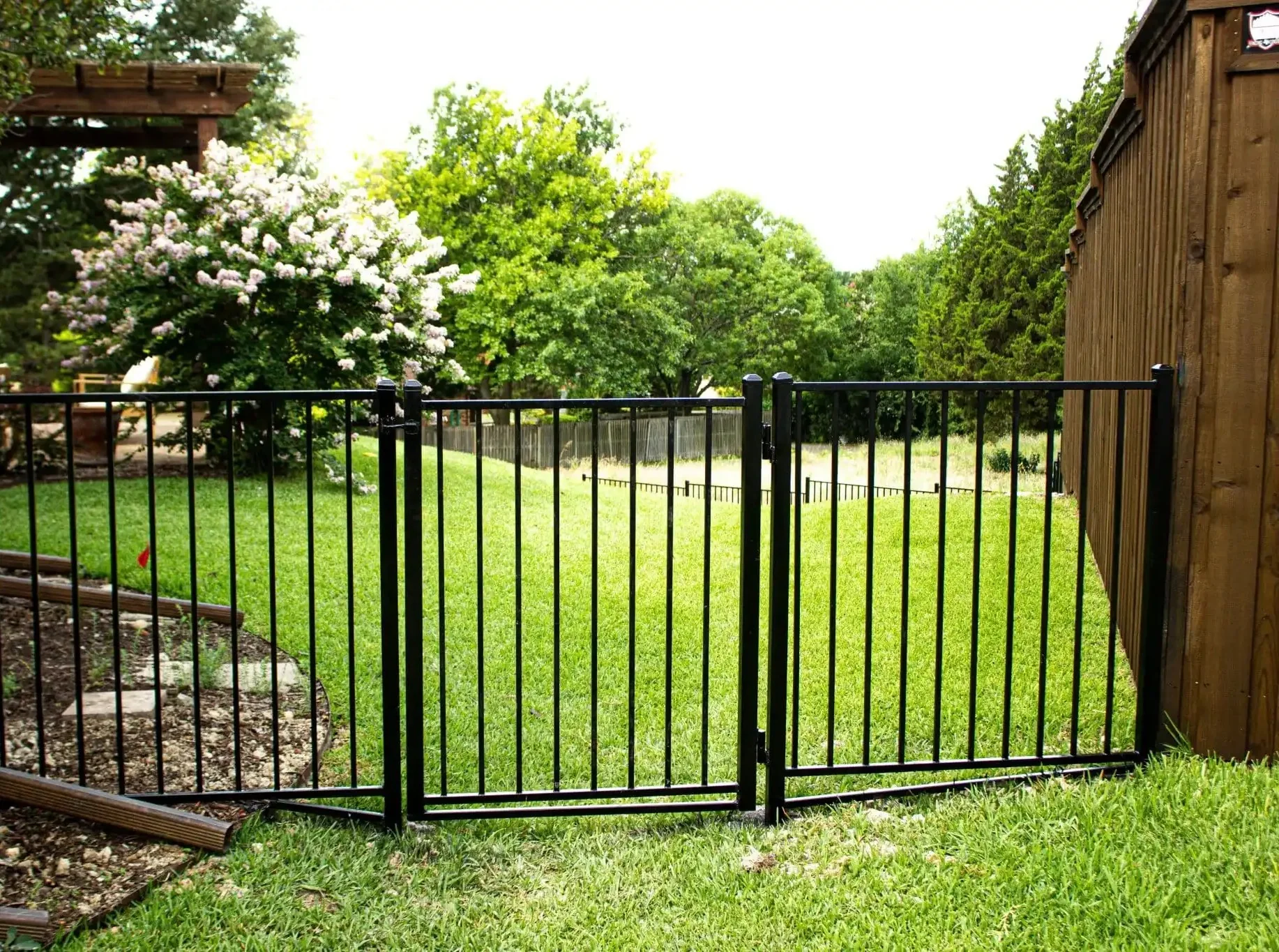 Black wrought iron style metal fence and gate in DFW, photo 2
